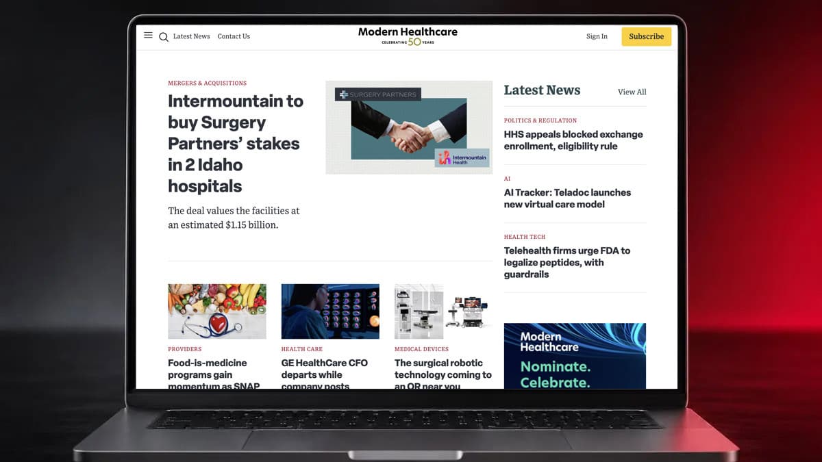 The Modern Healthcare homepage on a laptop